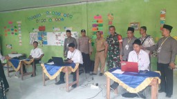 Pendampingan Babinsa pada Kegiatan Pelaksanaan Test Calon Perangkat Desa