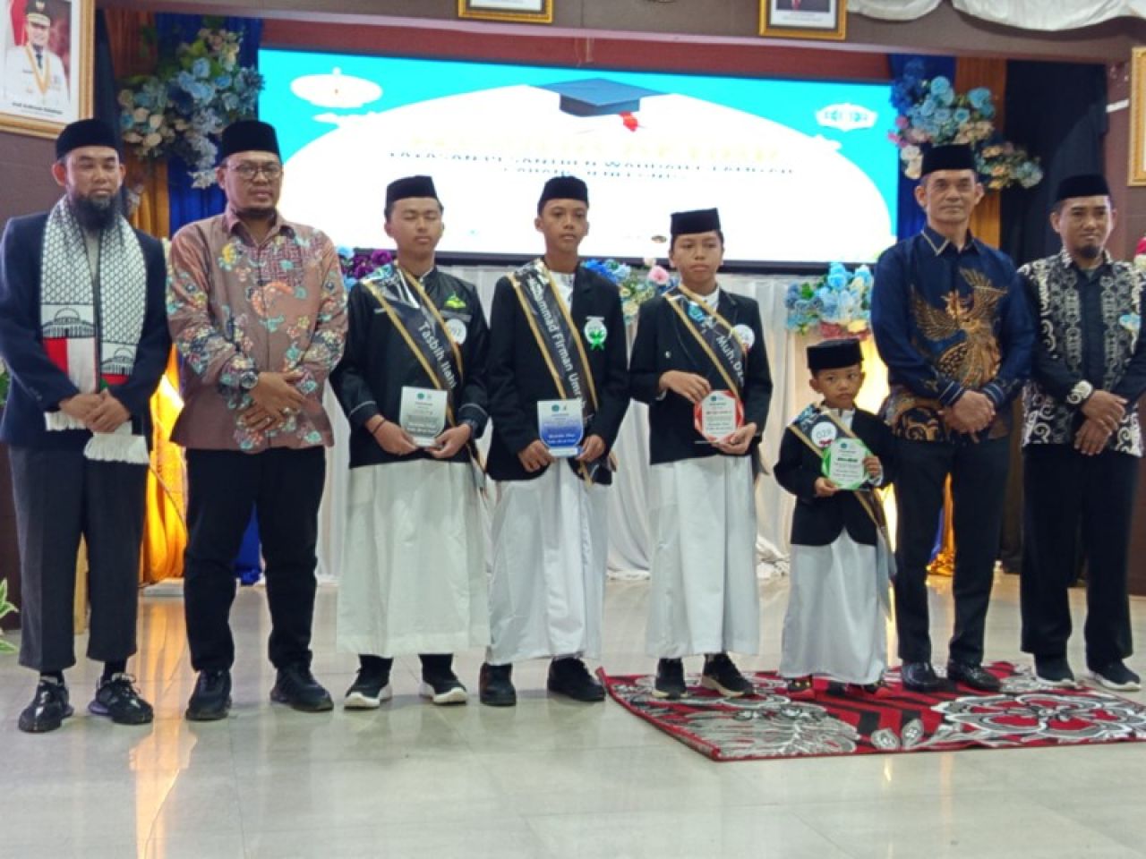 Mewakili Bupati Jeneponto, Kadis Kominfo dan Statistik Jeneponto Hadiri Wisuda Akbar YPWI Ulul Al Bab